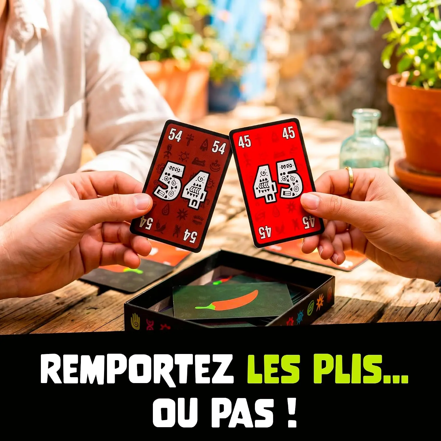 Deux cartes Pili Pili, 54 et 45, opposées pour remporter un pli